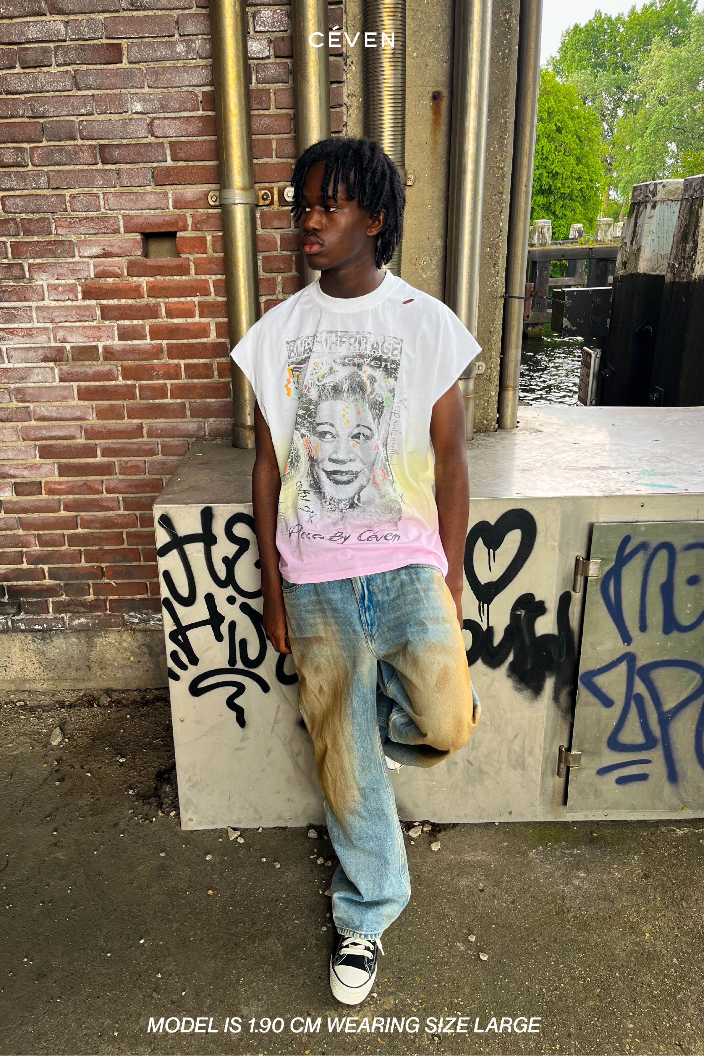 REBEL MUSIC SLEEVELESS TEE